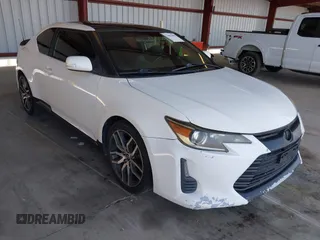 2014 Scion tC z VIN JTKJF5C74E3078384, wystawiony jako IAAI lot #42367606 z przebiegiem 251 790 mil mil oraz . Historia ofert i sprzedaży dostępna na DreamBid. Obrazek 1.
