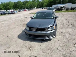 2015 Volkswagen Jetta SE z VIN 3VWD17AJ5FM309965, wystawiony jako Copart lot #54930665 z przebiegiem 141 918 mil mil oraz Szkoda całkowita • Salvage title. Historia ofert i sprzedaży dostępna na DreamBid. Obrazek 13.