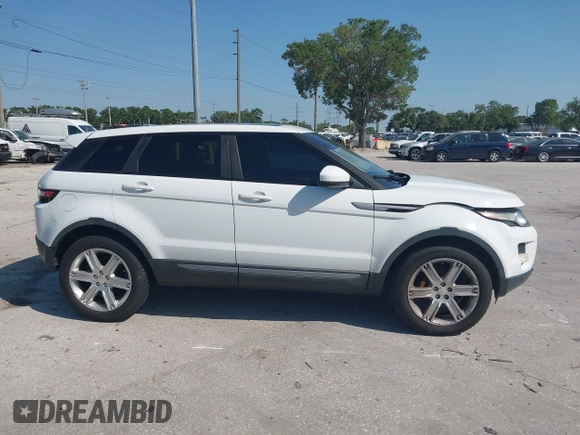 2015 Land Rover Range Rover Evoque Pure Premium z VIN SALVR2BG0FH964683, wystawiony jako IAAI lot #42016766 z przebiegiem 94 942 mil mil oraz . Historia ofert i sprzedaży dostępna na DreamBid. Obrazek 13.