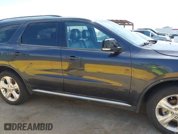 2014 Dodge Durango Limited with VIN 1C4RDJDG7EC586842, listed as a IAAI auction lot 42673969 with 134,094 mi miles and . Bid and sale history available at DreamBid. Image 13.