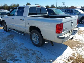 2005 Dodge Dakota Laramie with VIN 1D7HE58N35S138912, listed as a IAAI auction lot 41359470 with 263,136 mi miles. Bid and sale history available at carsss.com. Image 3.