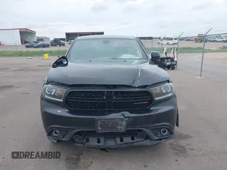 2014 Dodge Durango SXT with VIN 1C4RDJAG1EC552075, listed as a IAAI auction lot 42292301 with 122,427 mi miles and . Bid and sale history available at DreamBid. Image 12.