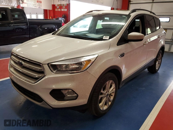 2018 Ford Escape SE z VIN 1FMCU9GD8JUC24993, wystawiony jako IAAI lot #42212167 z przebiegiem 119 019 mil mil oraz . Historia ofert i sprzedaży dostępna na DreamBid. Obrazek 1.