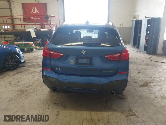 2019 BMW X1 xDrive28i with VIN WBXHT3C53K5L36690, listed as a IAAI auction lot 42012992 with 70,339 mi miles. Bid and sale history available at carsss.com. Image 16.