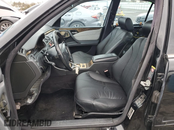 2002 Mercedes-Benz E with VIN WDBJF74J22B408004, listed as a Copart auction lot 52701805 with 240,246 mi miles and Clean Title. Bid and sale history available at DreamBid. Image 7.