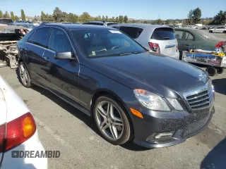 2011 Mercedes-Benz E 550 Luxury with VIN WDDHF7CB7BA301181, listed as a Copart auction lot 71566514 with 88,839 mi miles and Salvage Title. Bid and sale history available at DreamBid. Image 4.