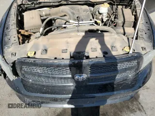 2014 Ram 1500 Tradesman z VIN 3C6JR7AT0EG123027, wystawiony jako Copart lot #51456875 z przebiegiem 115 036 mil mil oraz Szkoda całkowita • Salvage title. Historia ofert i sprzedaży dostępna na DreamBid. Obrazek 11.