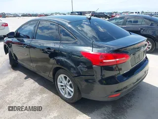 2015 Ford Focus SE with VIN 1FADP3F2XFL313657, listed as a IAAI auction lot 42205474 with 161,353 mi miles and . Bid and sale history available at DreamBid. Image 3.