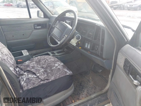 1995 Jeep Cherokee with VIN 1J4FN68S7SL656597, listed as a IAAI auction lot 42028053 with 364,364 mi miles and . Bid and sale history available at DreamBid. Image 5.