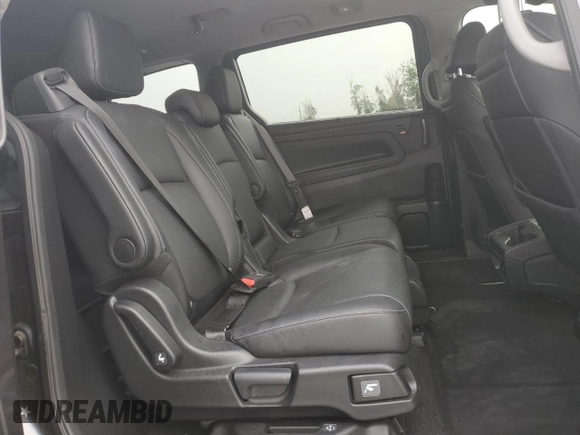 2024 Honda Odyssey Touring z VIN 5FNRL6H85RB016317, wystawiony jako Copart lot #59483565 z przebiegiem 17 351 mil mil oraz Nie do naprawy • Non repairable. Historia ofert i sprzedaży dostępna na DreamBid. Obrazek 11.