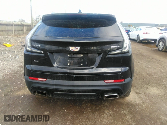 2021 Cadillac XT4 AWD Sport with VIN 1GYFZFR48MF009552, listed as a IAAI auction lot 41743125 with 53,982 mi miles and . Bid and sale history available at DreamBid. Image 16.