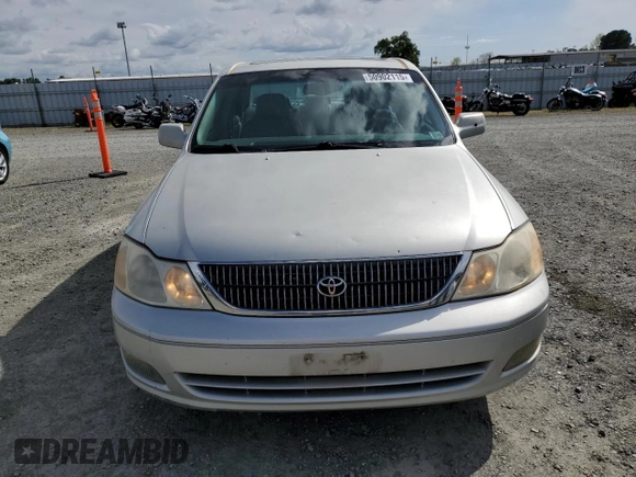 2000 Toyota Avalon XL with VIN 4T1BF28B3YU002835, listed as a Copart auction lot 50902115 with 128,699 mi miles and Salvage Title. Bid and sale history available at DreamBid. Image 5.