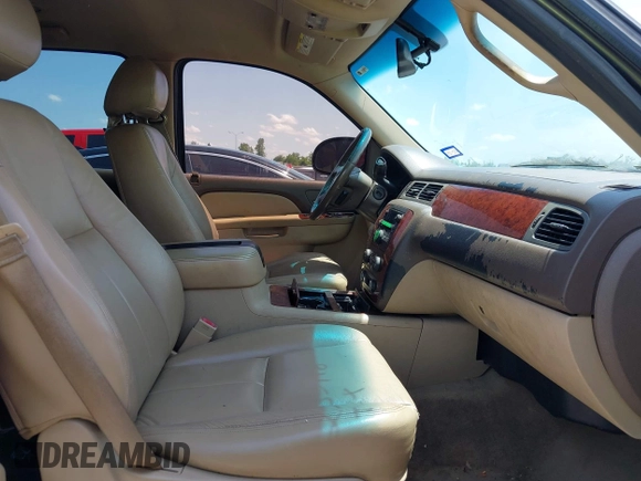 2011 Chevrolet Tahoe LS with VIN 1GNSCAE00BR343816, listed as a IAAI auction lot 42363718 with 253,212 mi miles and . Bid and sale history available at DreamBid. Image 5.