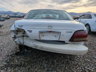 1999 Mazda 626 ES with VIN 1YVGF22C9X5887587, listed as a Copart auction lot 46346305 with 92,715 mi miles and Salvage Title. Bid and sale history available at carsss.com. Image 6.