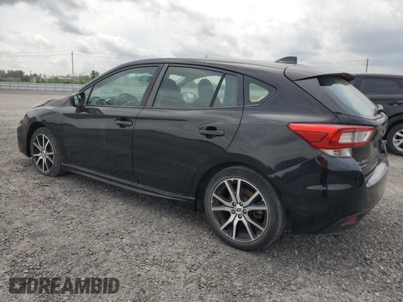 2018 Subaru Impreza with VIN 4S3GTAF65J1751579, listed as a Copart auction lot 61690535 with 77,316 mi miles and Salvage title. Bid and sale history available at DreamBid. Image 2.