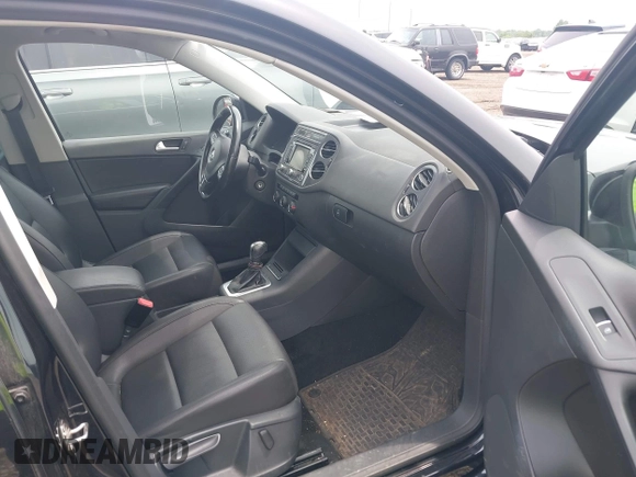 2013 Volkswagen Tiguan S with VIN WVGBV3AX7DW611410, listed as a IAAI auction lot 42549561 with 115,855 mi miles and . Bid and sale history available at DreamBid. Image 5.