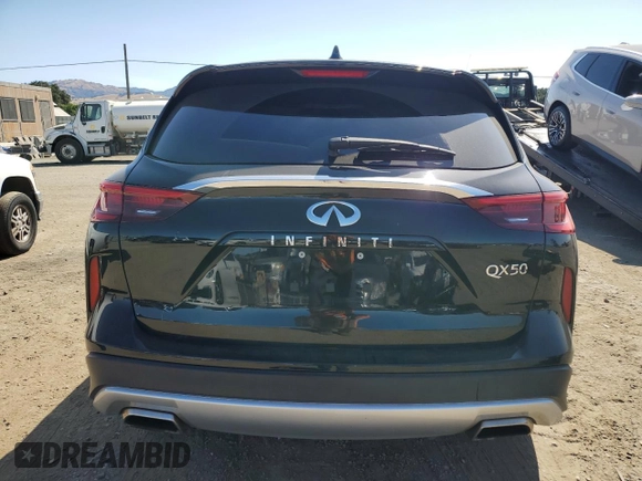 2019 Infiniti QX50 Luxe with VIN 3PCAJ5M11KF135820, listed as a Copart auction lot 58024215 with 64,340 mi miles and Salvage title. Bid and sale history available at DreamBid. Image 6.
