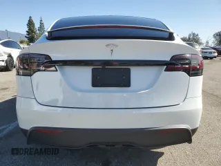 2023 Tesla Model X with VIN 7SAXCDE52PF378496, listed as a Copart auction lot 49455825 with Not Provided miles and Salvage Title. Bid and sale history available at DreamBid. Image 6.