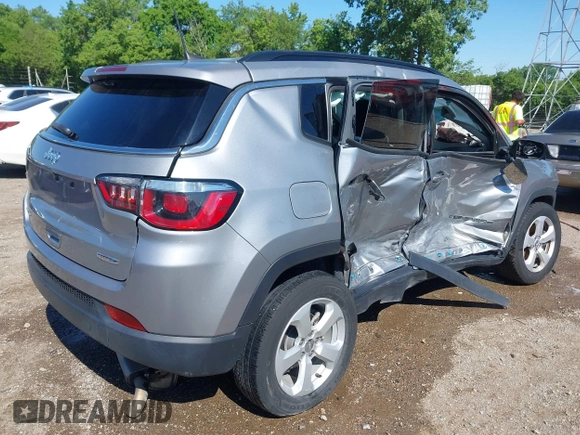 2019 Jeep Compass Latitude z VIN 3C4NJDBB6KT697110, wystawiony jako IAAI lot #42331753 z przebiegiem 52 897 mil mil oraz . Historia ofert i sprzedaży dostępna na DreamBid. Obrazek 4.