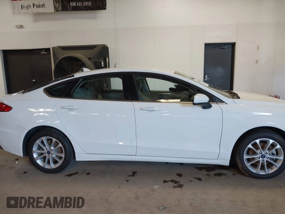 2020 Ford Fusion Hybrid SE with VIN 3FA6P0LU7LR173500, listed as a IAAI auction lot 41368311 with 105,202 mi miles. Bid and sale history available at carsss.com. Image 14.