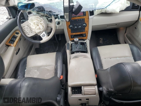 2009 Jeep Grand Cherokee Limited with VIN 1J8HS58T09C554863, listed as a Copart auction lot 55008995 with 136,762 mi miles and Salvage title. Bid and sale history available at DreamBid. Image 8.