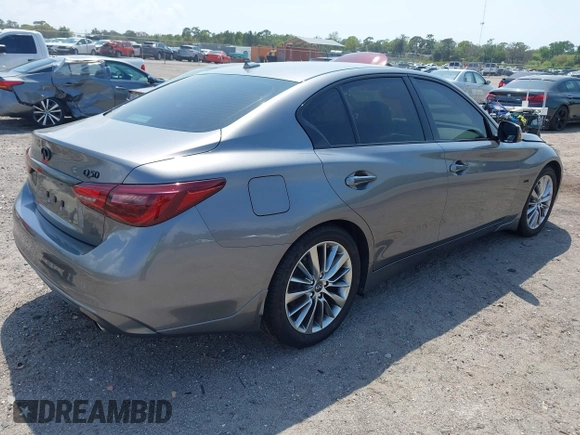 2018 Infiniti Q50 Luxe with VIN JN1EV7AP4JM590048, listed as a IAAI auction lot 41863410 with 55,727 mi miles and . Bid and sale history available at carsss.com. Image 4.