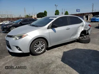 2014 Toyota Corolla L with VIN 5YFBURHE6EP103874, listed as a Copart auction lot 57648565 with Not provided miles and Salvage title. Bid and sale history available at DreamBid. Image 1.