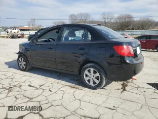 2010 Kia Rio LX with VIN KNADH4A3XA6652808, listed as a Copart auction lot 42597245 with 164,768 mi miles and Salvage Title. Bid and sale history available at carsss.com. Image 2.