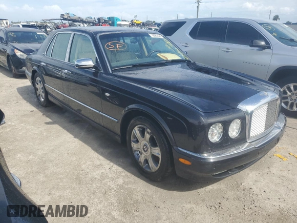2006 Bentley Arnage R с VIN SCBLC37F26CX11385, выставлен на аукционе Copart как лот 76563524 с пробегом 23 197 миль миль и Списание • Salvage title. История ставок и продаж доступна на DreamBid. Изображение 4.