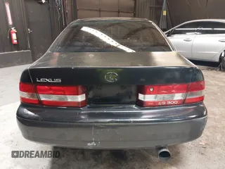 2001 Lexus ES 300 z VIN JT8BF28G415112517, wystawiony jako IAAI lot #42208849 z przebiegiem 202 029 mil mil oraz . Historia ofert i sprzedaży dostępna na DreamBid. Obrazek 16.
