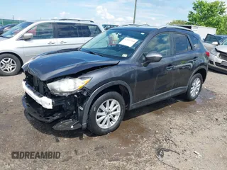 2015 Mazda CX-5 Touring with VIN JM3KE4CY9F0506879, listed as a IAAI auction lot 42209768 with 87,690 mi miles and . Bid and sale history available at DreamBid. Image 18.