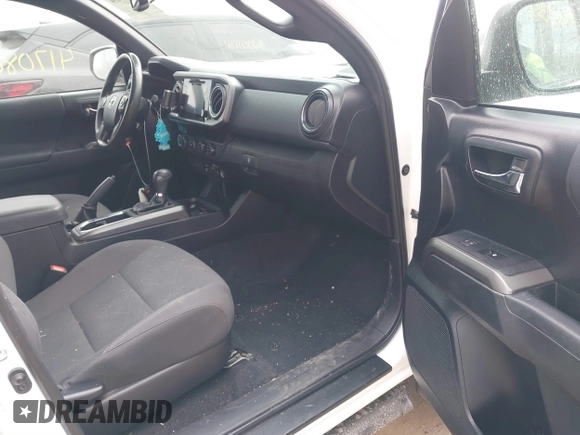 2018 Toyota Tacoma SR5 with VIN 3TMDZ5BN9JM051105, listed as a IAAI auction lot 41708034 with 98,000 mi miles and . Bid and sale history available at DreamBid. Image 5.