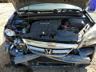 2005 Honda Odyssey EX-L z VIN 5FNRL386X5B034514, wystawiony jako Copart lot #52702435 z przebiegiem 65 988 mil mil oraz Szkoda całkowita • Salvage title. Historia ofert i sprzedaży dostępna na DreamBid. Obrazek 13.