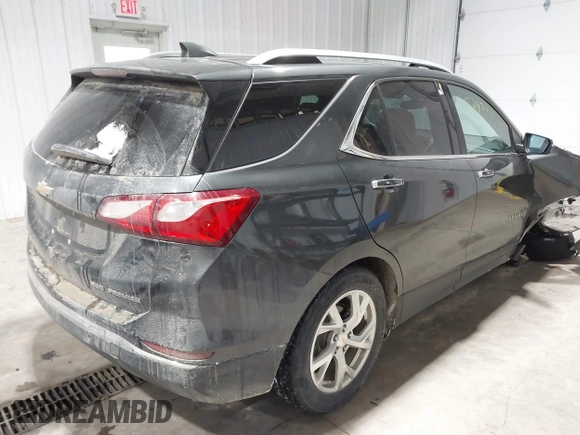 2019 Chevrolet Equinox Premier with VIN 2GNAXXEV2K6127055, listed as a IAAI auction lot 41598381 with 132,126 mi miles and . Bid and sale history available at DreamBid. Image 4.