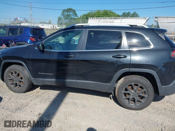 2016 Jeep Cherokee Latitude with VIN 1C4PJMCB2GW236835, listed as a IAAI auction lot 42698119 with 111,985 mi miles and . Bid and sale history available at DreamBid. Image 14.