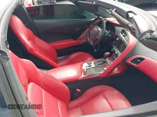 2016 Chevrolet Corvette Z51 3LT z VIN 1G1YM2D76G5116786, wystawiony jako IAAI lot #41815554 z przebiegiem 67 466 mil mil oraz . Historia ofert i sprzedaży dostępna na DreamBid. Obrazek 5.