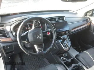 2017 Honda CR-V Touring with VIN 2HKRW1H96HH517669, listed as a IAAI auction lot 41653040 with 97,961 mi miles. Bid and sale history available at carsss.com. Image 22.