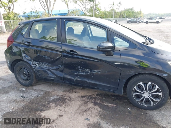 2016 Honda Fit LX with VIN JHMGK5H59GS002090, listed as a IAAI auction lot 41761887 with 97,577 mi miles. Bid and sale history available at carsss.com. Image 6.
