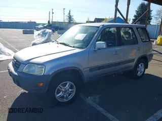 2001 Honda CR-V EX with VIN JHLRD18671C013132, listed as a IAAI auction lot 42057704 with 261,635 mi miles. Bid and sale history available at carsss.com. Image 16.