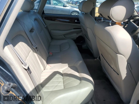 1998 Jaguar XJ with VIN SAJHX1247WC841374, listed as a Copart auction lot 51693595 with 109,509 mi miles and Clean Title. Bid and sale history available at DreamBid. Image 10.