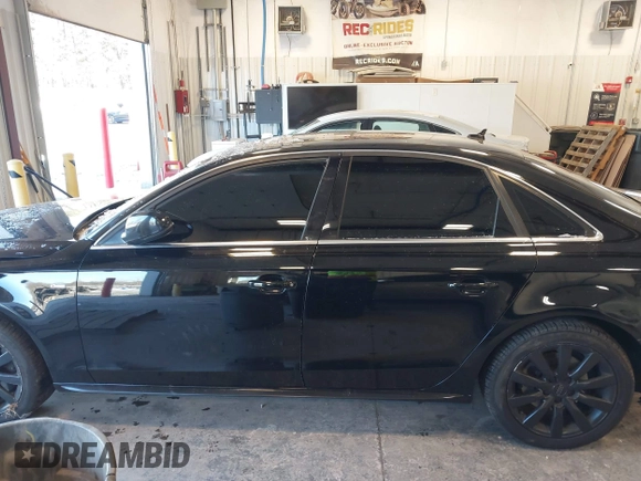 2015 Audi A4 Premium with VIN WAUBFAFL2FN044377, listed as a IAAI auction lot 41230721 with 144,942 mi miles. Bid and sale history available at carsss.com. Image 14.