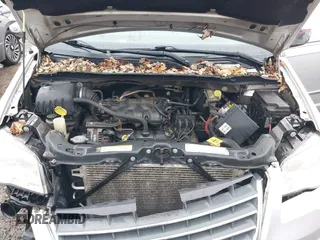 2010 Chrysler Town & Country Touring with VIN 2A4RR5D14AR293299, listed as a IAAI auction lot 41184584 with 245,928 mi miles. Bid and sale history available at carsss.com. Image 10.