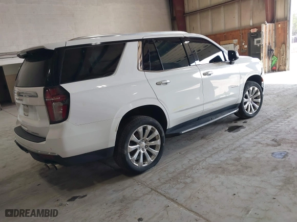 2023 Chevrolet Tahoe Premier with VIN 1GNSKSKD0PR217513, listed as a IAAI auction lot 41779222 with 55,424 mi miles. Bid and sale history available at carsss.com. Image 4.