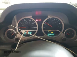 2007 Jeep Wrangler Rubicon z VIN 1J8GA64117L187431, wystawiony jako Copart lot #61293624 z przebiegiem 263 459 mil mil oraz Szkoda całkowita • Salvage title. Historia ofert i sprzedaży dostępna na DreamBid. Obrazek 9.