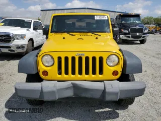 2009 Jeep Wrangler X with VIN 1J4FA241X9L765664, listed as a Copart auction lot 51802065 with 137,053 mi miles and Salvage Title. Bid and sale history available at DreamBid. Image 5.