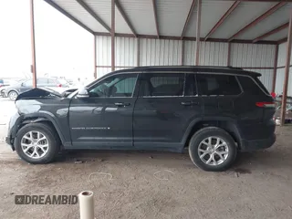 2023 Jeep Grand Cherokee Limited with VIN 1C4RJKBG0P8810475, listed as a IAAI auction lot 41615533 with 28,671 mi miles and . Bid and sale history available at DreamBid. Image 14.
