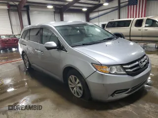 2016 Honda Odyssey SE with VIN 5FNRL5H31GB109718, listed as a Copart auction lot 54689915 with 48,933 mi miles and Salvage Title. Bid and sale history available at DreamBid. Image 4.