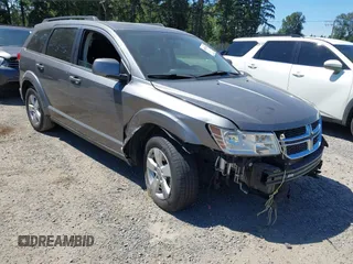 2012 Dodge Journey SXT with VIN 3C4PDCBG2CT363986, listed as a IAAI auction lot 42676110 with 75,020 mi miles and . Bid and sale history available at DreamBid. Image 1.