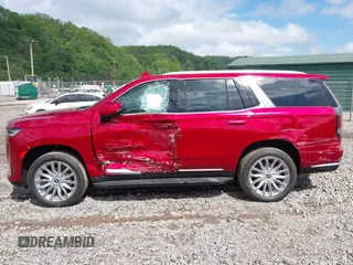2021 Cadillac Escalade Premium Luxury z VIN 1GYS4BKL6MR453583, wystawiony jako IAAI lot #42129264 z przebiegiem 11 322 mil mil oraz . Historia ofert i sprzedaży dostępna na DreamBid. Obrazek 14.