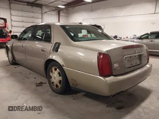 2004 Cadillac DeVille z VIN 1G6KD54Y04U119341, wystawiony jako IAAI lot #42193664 z przebiegiem 162 290 mil mil oraz . Historia ofert i sprzedaży dostępna na DreamBid. Obrazek 3.